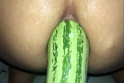 Desi sex in a large cucumber in her.